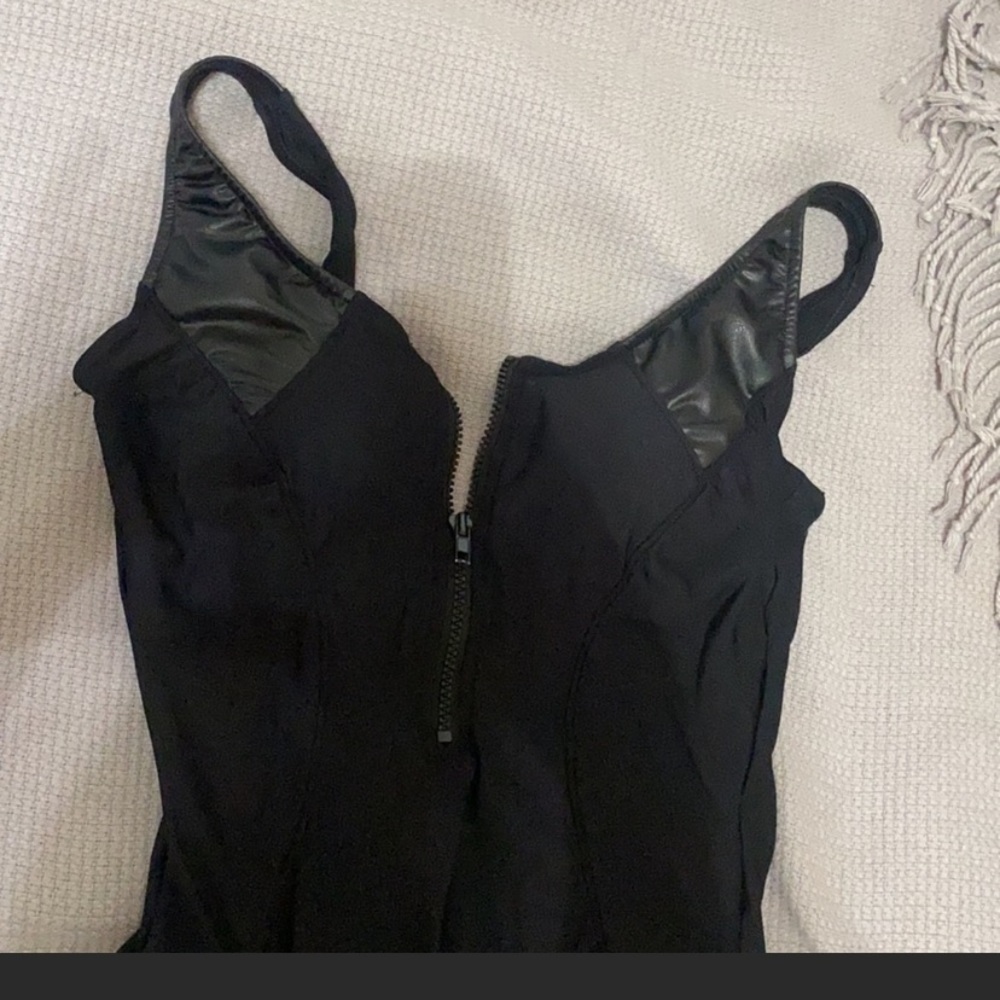 Cute one piece swimsuit with leather detailing